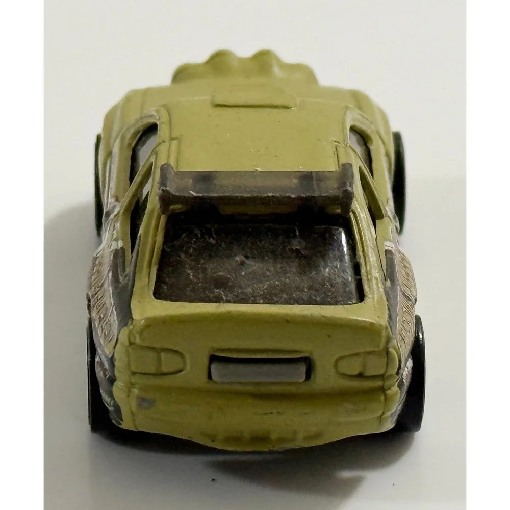 Hot Wheels Escort Rally Kids 1/64 Tan Fossil Fueled T-Rex Dinosaur Car 1996